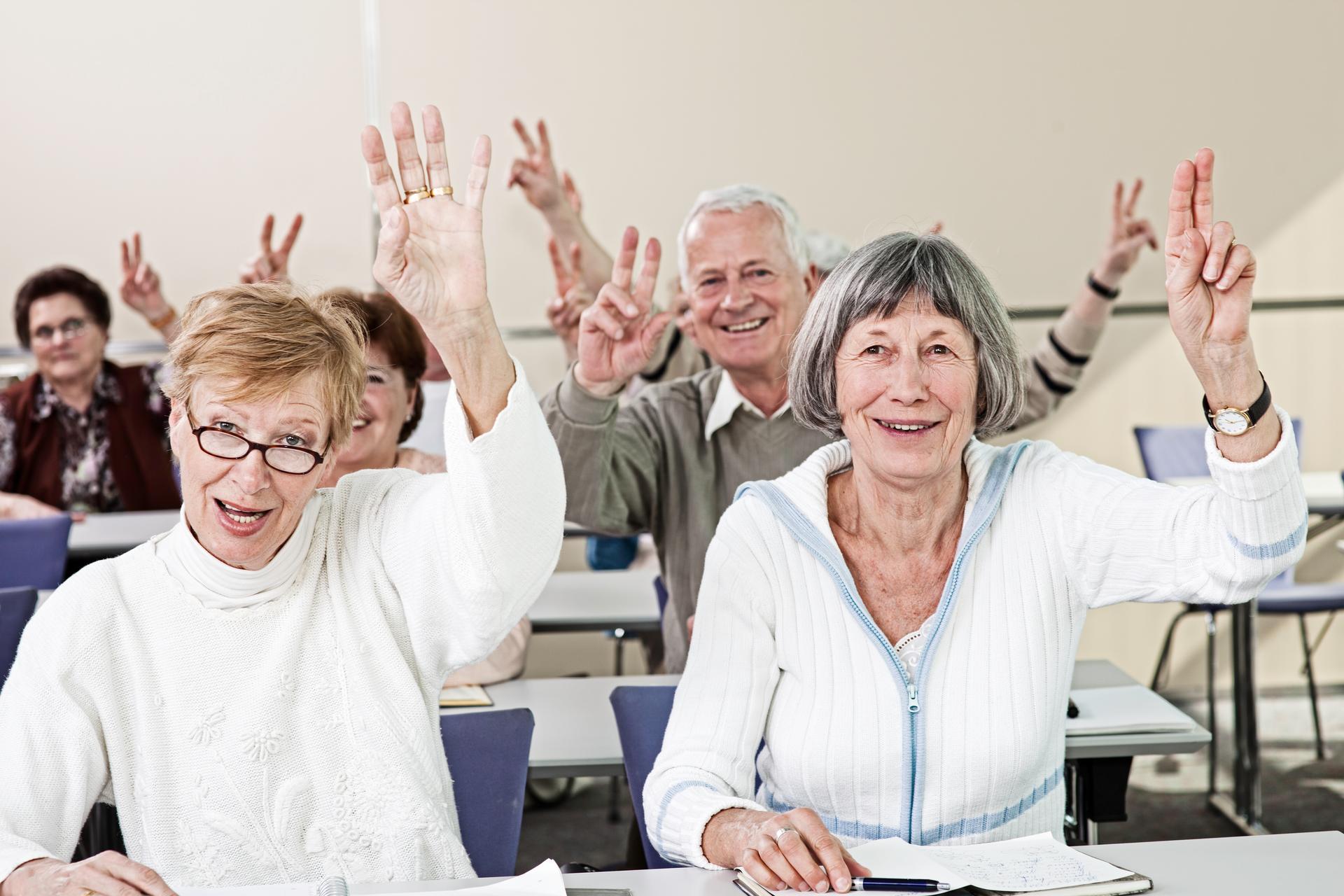 Seniors On Seminar Raising Hands